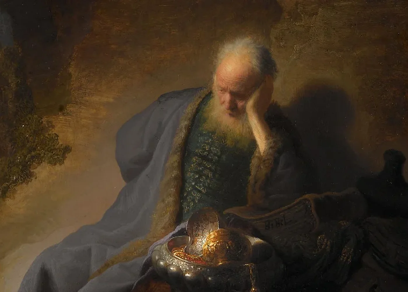 Jeremiah Lamenting the Destruction of Jerusalem, a solitary figure in grief amid the ruins of a great city.