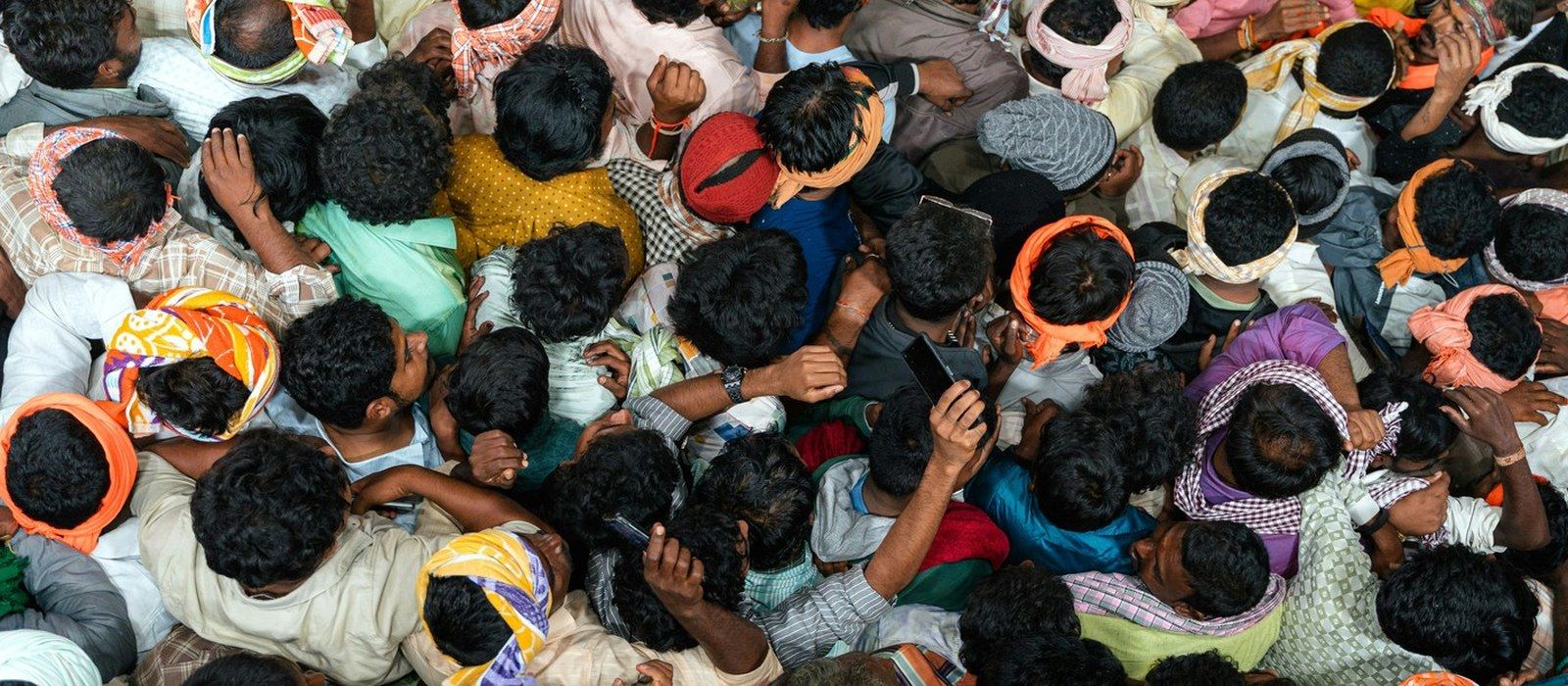 A crowd of people seen from above.